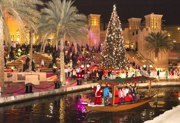 Madinat Jumeirah Christmas tree with abra ride and festive lights